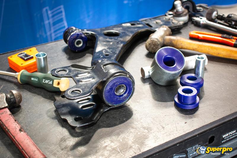 SPF3370K being fitted into the control arms along with the lower inner front bushes (SPF3115K)